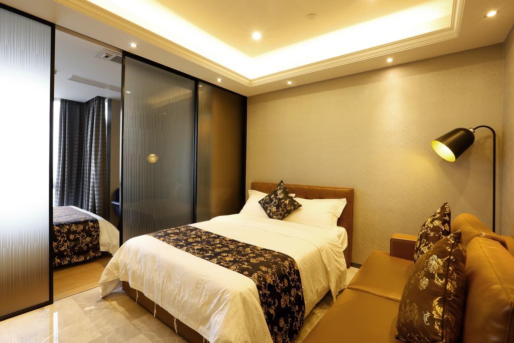 Boman Holiday Apartment Bei Jing Lu Jie Deng Du Hui Branch Guangzhou Eksteriør bilde