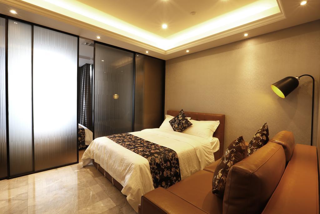Boman Holiday Apartment Bei Jing Lu Jie Deng Du Hui Branch Guangzhou Eksteriør bilde